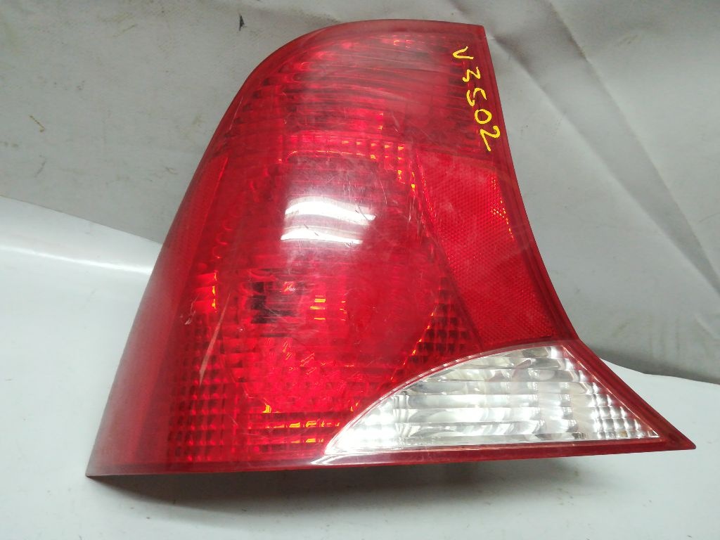 Фонарь задний левый к Ford Focus 2001