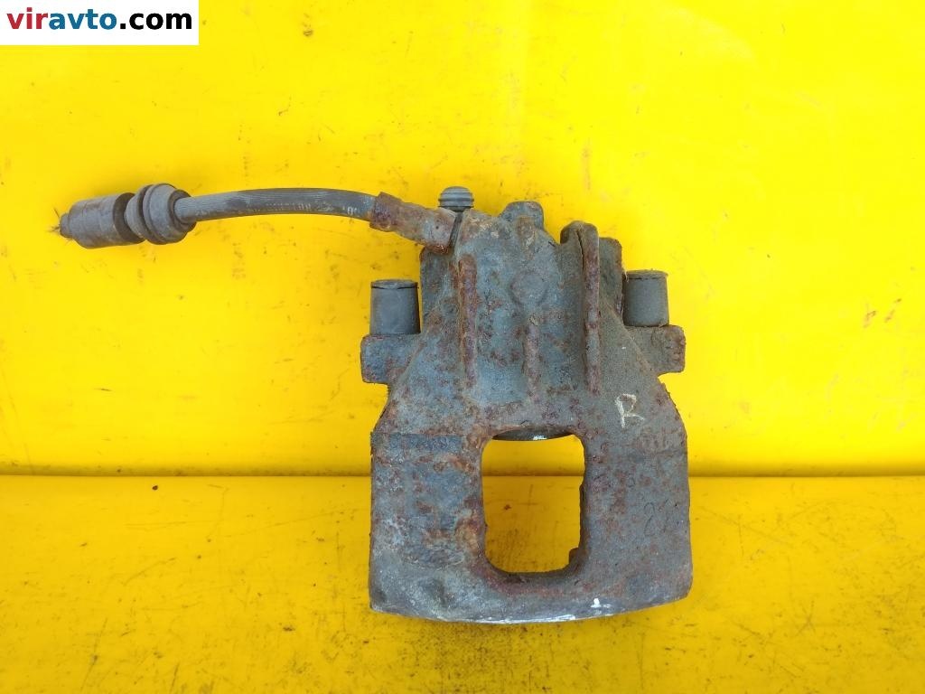 Суппорт передний правый к Ford Focus 2000