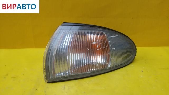 Поворотник левый к Mitsubishi Colt 1994