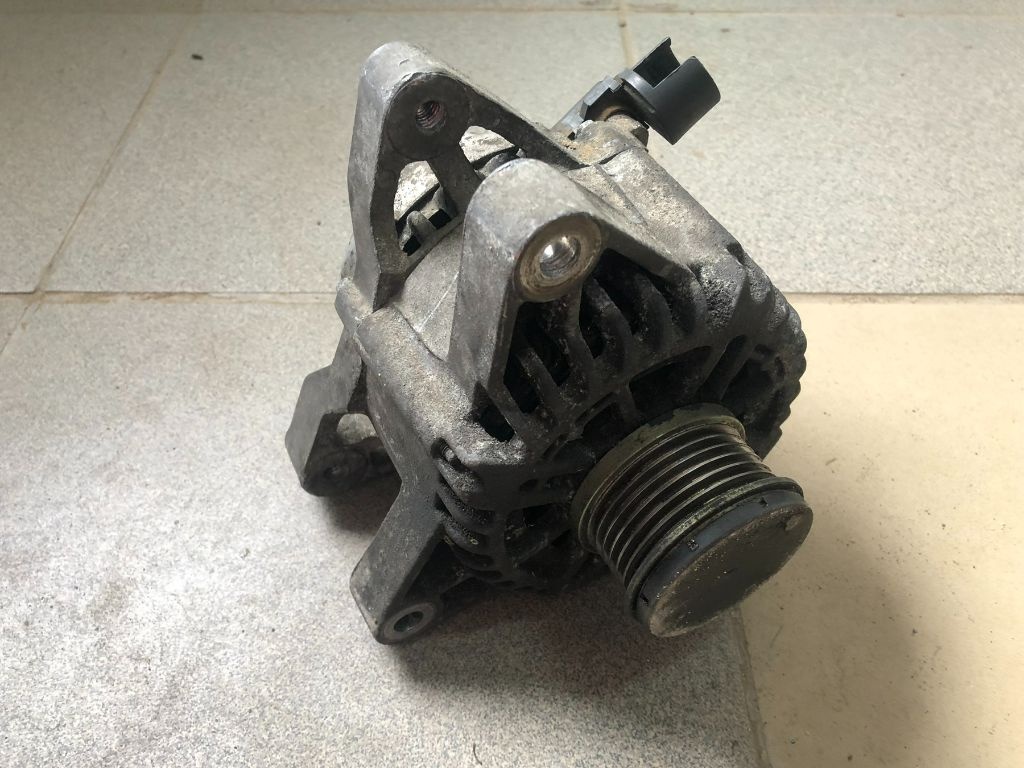Генератор к Mazda 323 1999
