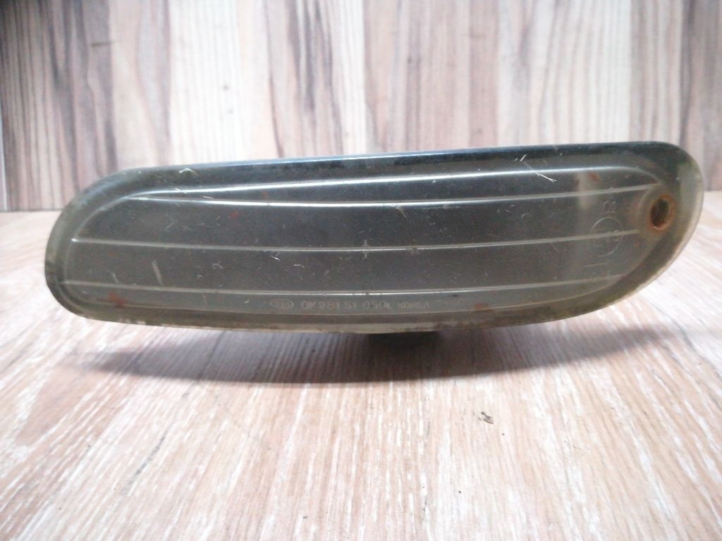 Поворотник левый к Kia Shuma 1999