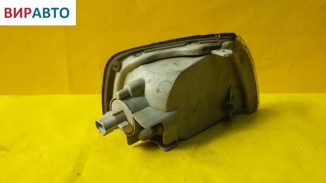 Поворотник левый к Mitsubishi Colt 1996