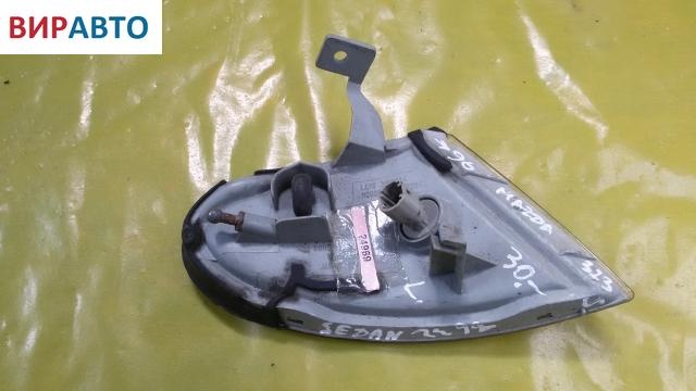 Поворотник левый к Mazda 323 1995