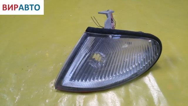 Поворотник левый к Mazda 323 1994