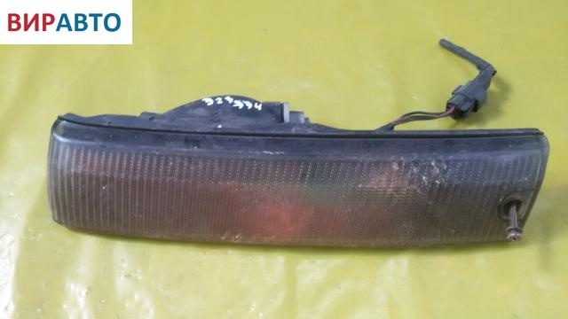 Поворотник левый к Mazda 323 1993