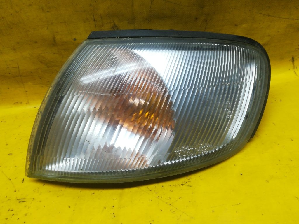 Поворотник левый к Nissan Almera 1996