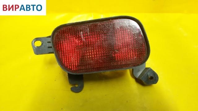 Фонарь противотуманный левый к Mazda 323 1996
