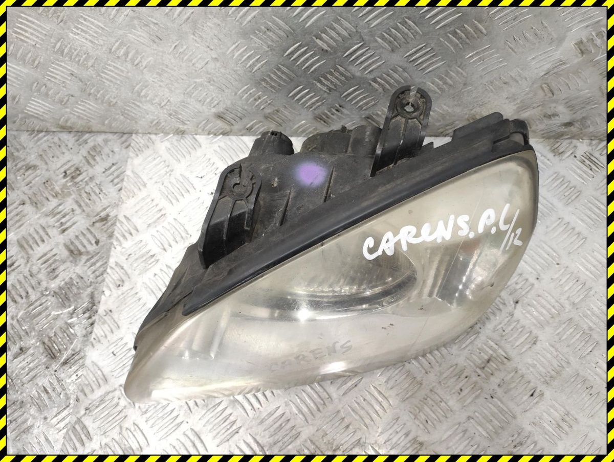 Фара левая к Kia Carens 2003