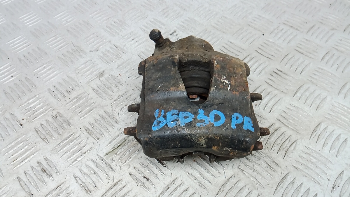 Суппорт передний левый к Volkswagen Jetta 2008