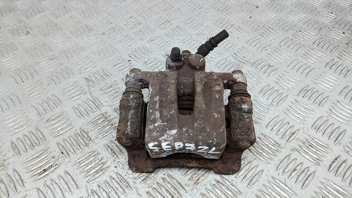 Суппорт задний левый к Hyundai ix35 2012