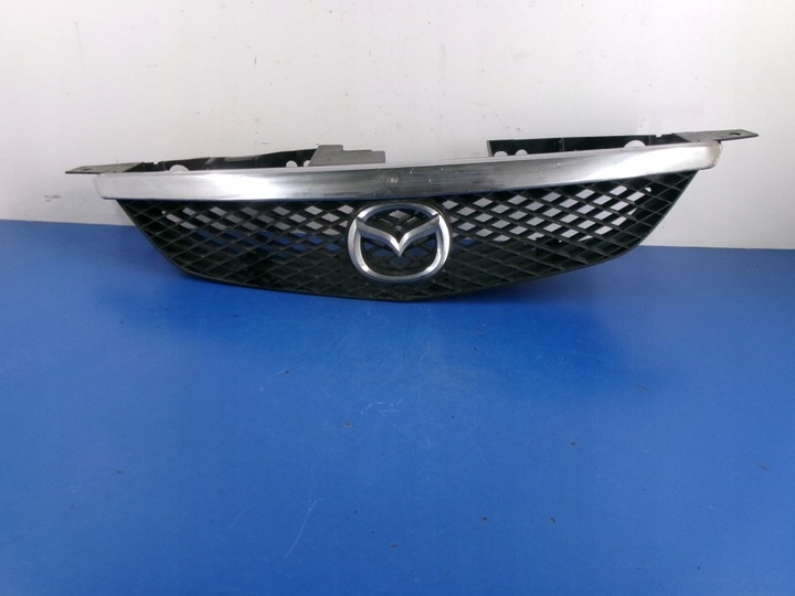 Решетка радиатора к Mazda 323 1998