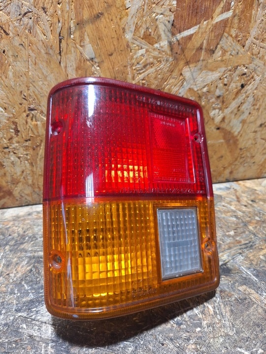 Фонарь задний левый к Mitsubishi i 2006