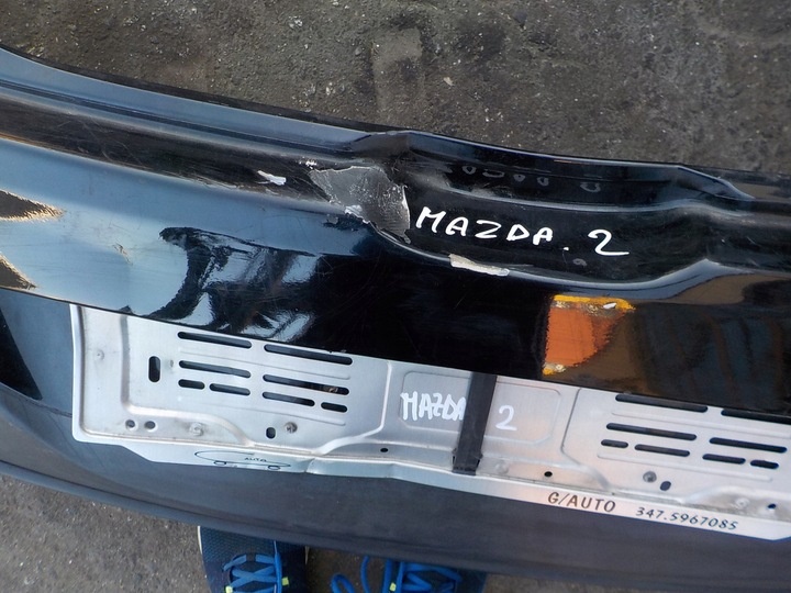 Бампер задний к Mazda 2 2007