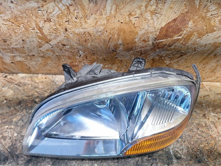 Фара левая к Suzuki Ignis 2000