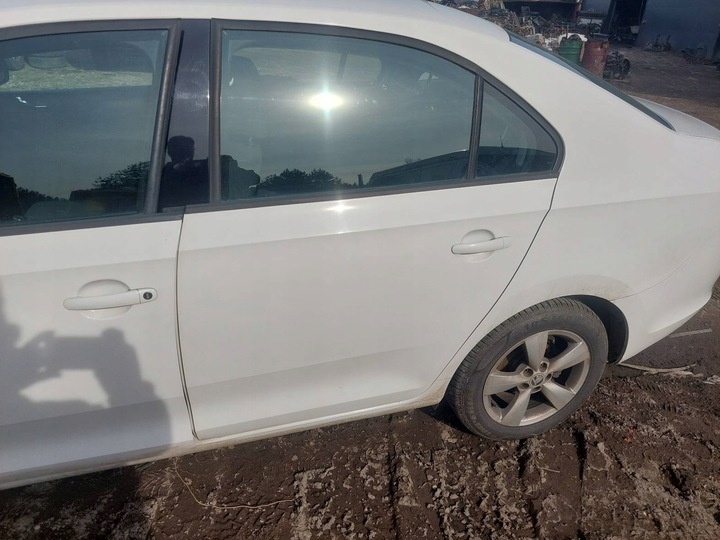Дверь задняя левая к Skoda Rapid 2012