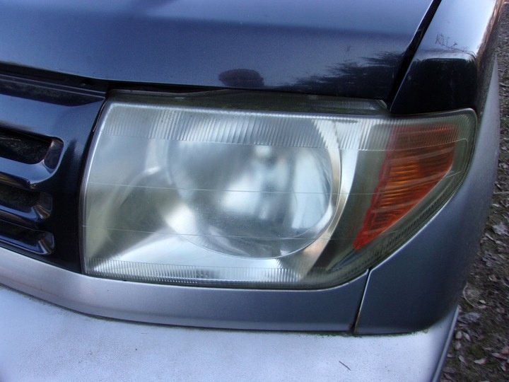Фара левая к Mitsubishi i 2006