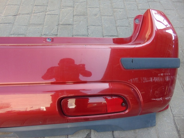 Бампер задний к Suzuki Ignis 2000