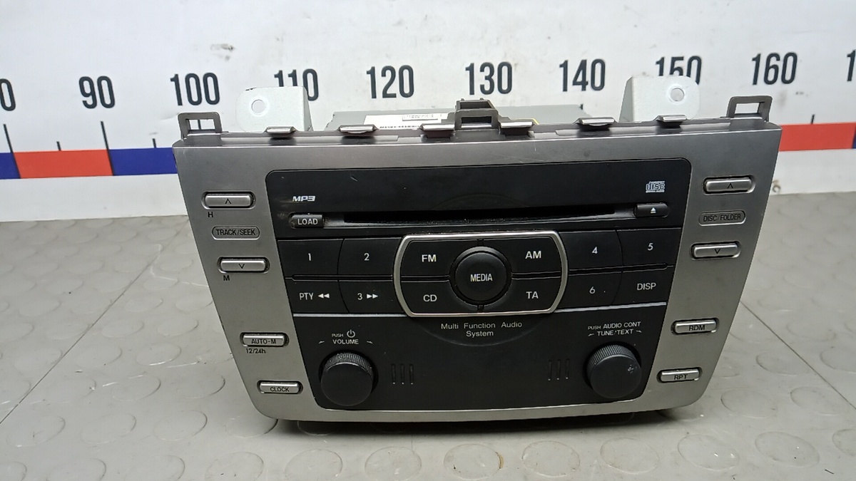 Магнитола к Mazda 156 2009