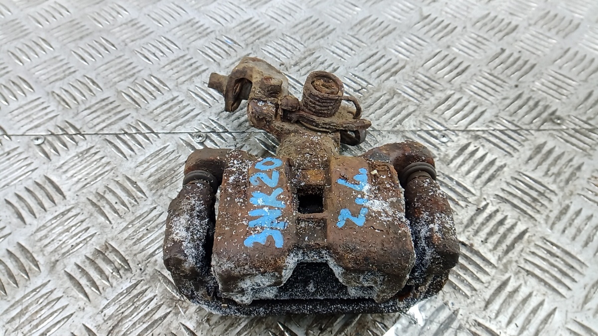 Скоба суппорта к Mazda 156 2009