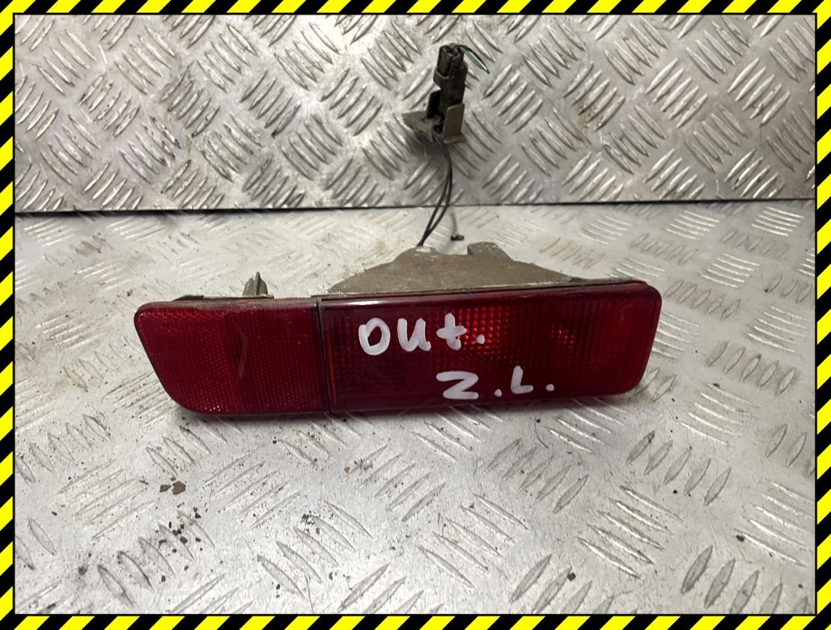 Фонарь противотуманный левый к Mitsubishi Outlander 2004