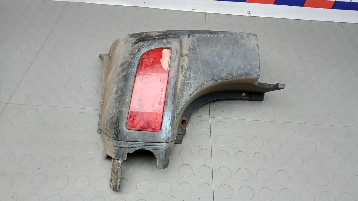 Клык бампера задний левый к Volkswagen  2010