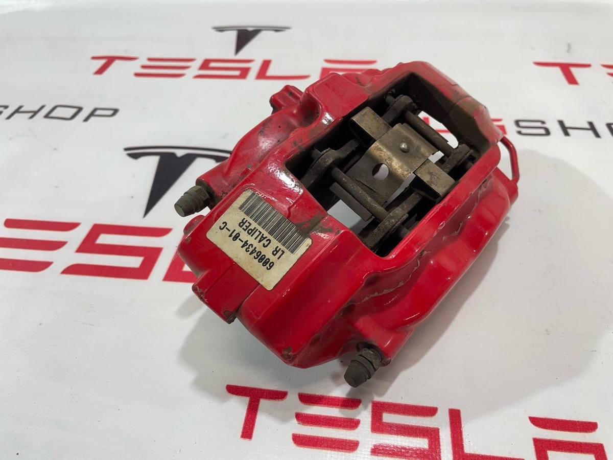 Суппорт задний левый к Tesla Model S 2015