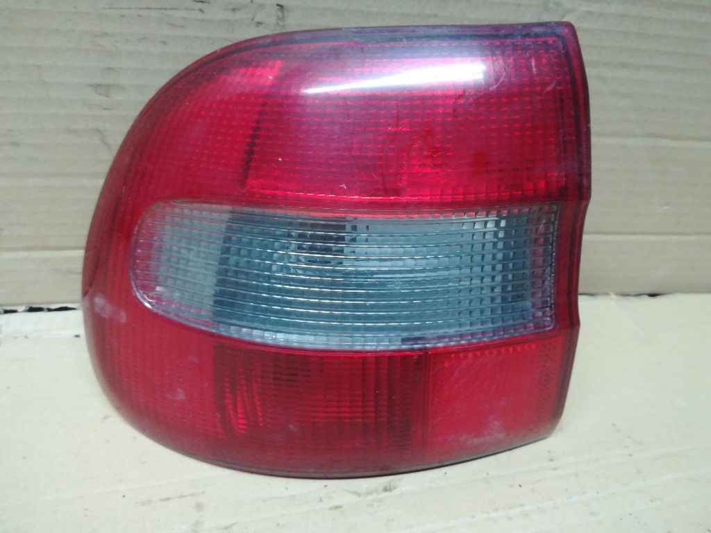Фонарь задний левый к Volvo V40 1999