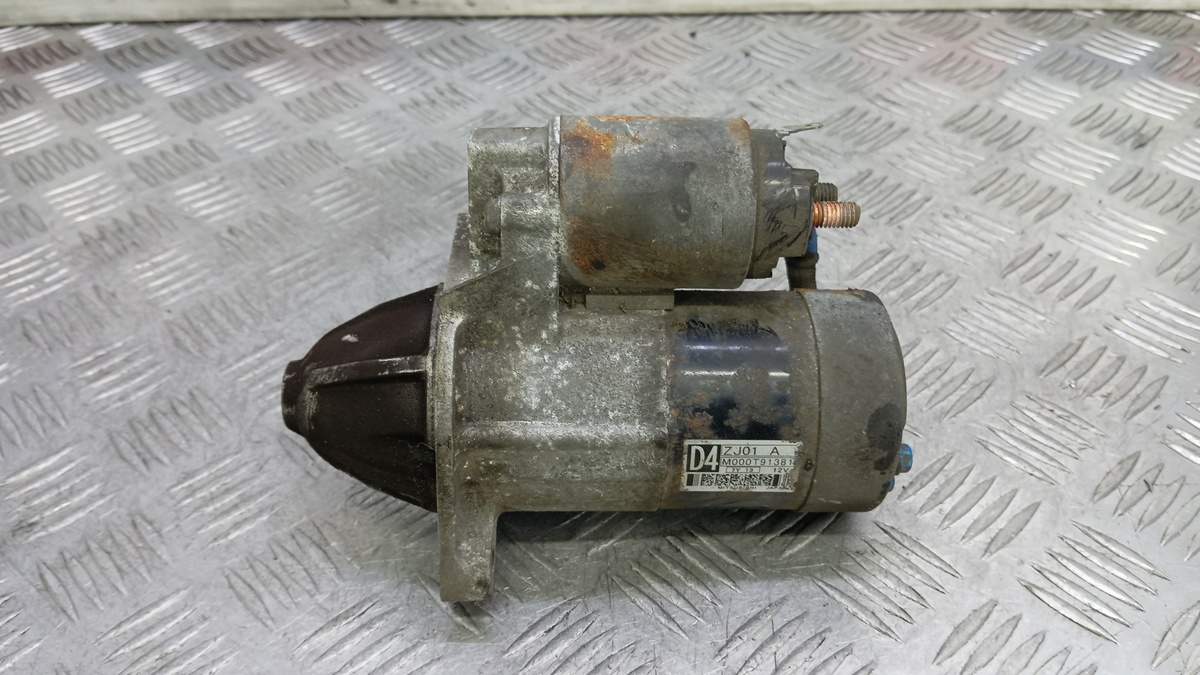 Стартер к Mazda 100 2008