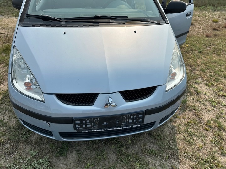 Капот к Mitsubishi Colt 2002
