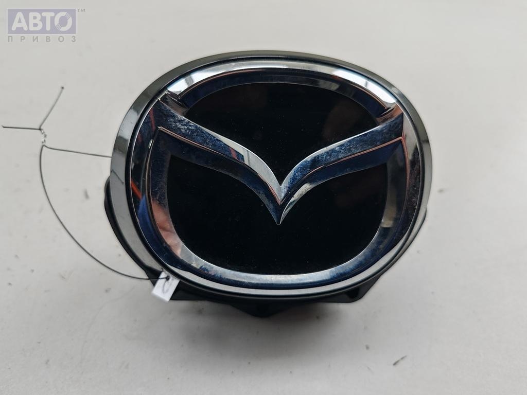 Эмблема к Mazda 3 2019