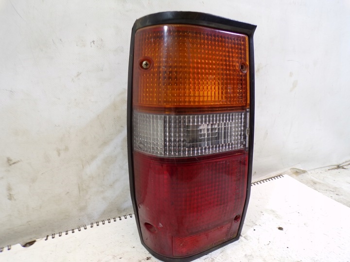 Фонарь задний левый к Mitsubishi i 2006