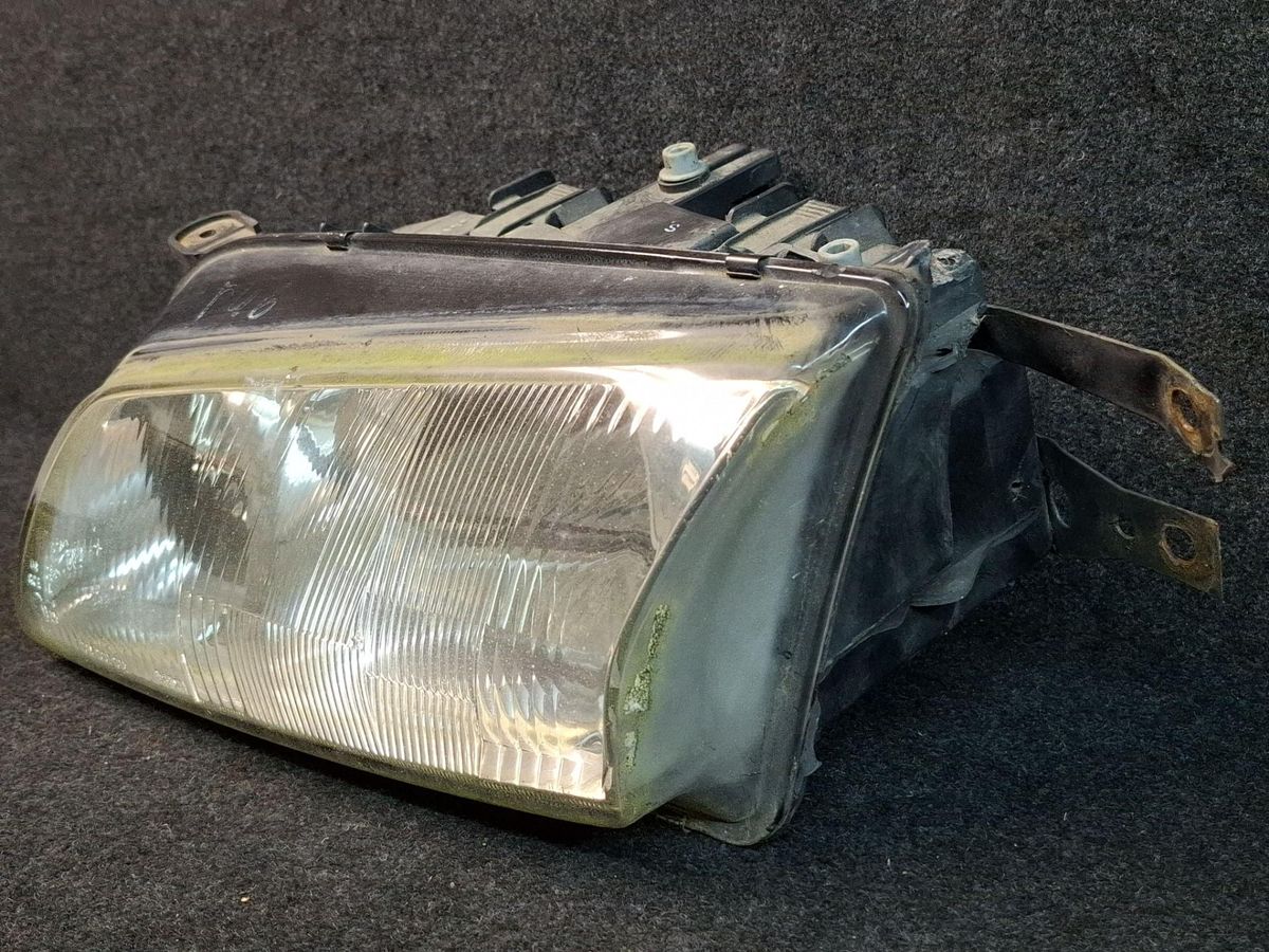 Фара левая к Mazda 626 2001