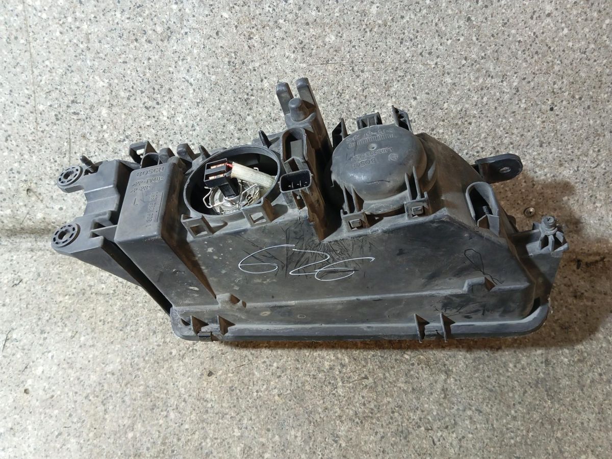 Фара левая к Mazda 626 2001