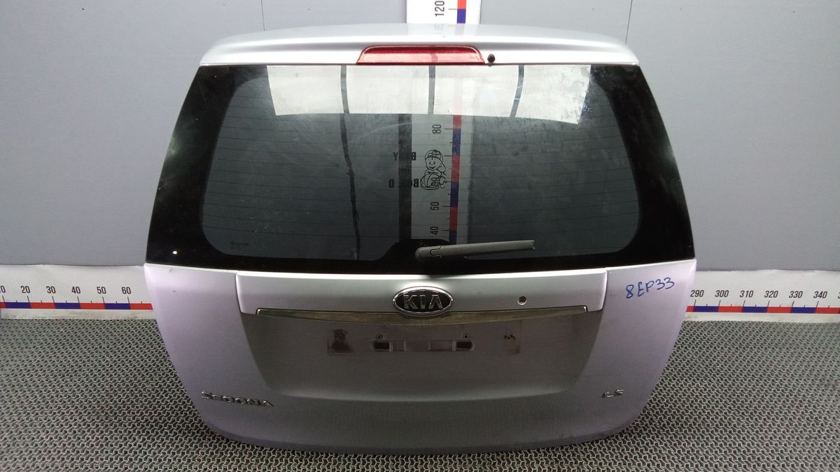 Моторчик стеклоочистителя  к Kia Carnival 2009