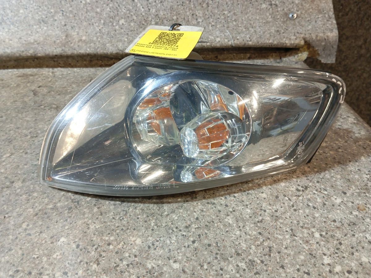 Поворотник левый к Mazda 626 2001