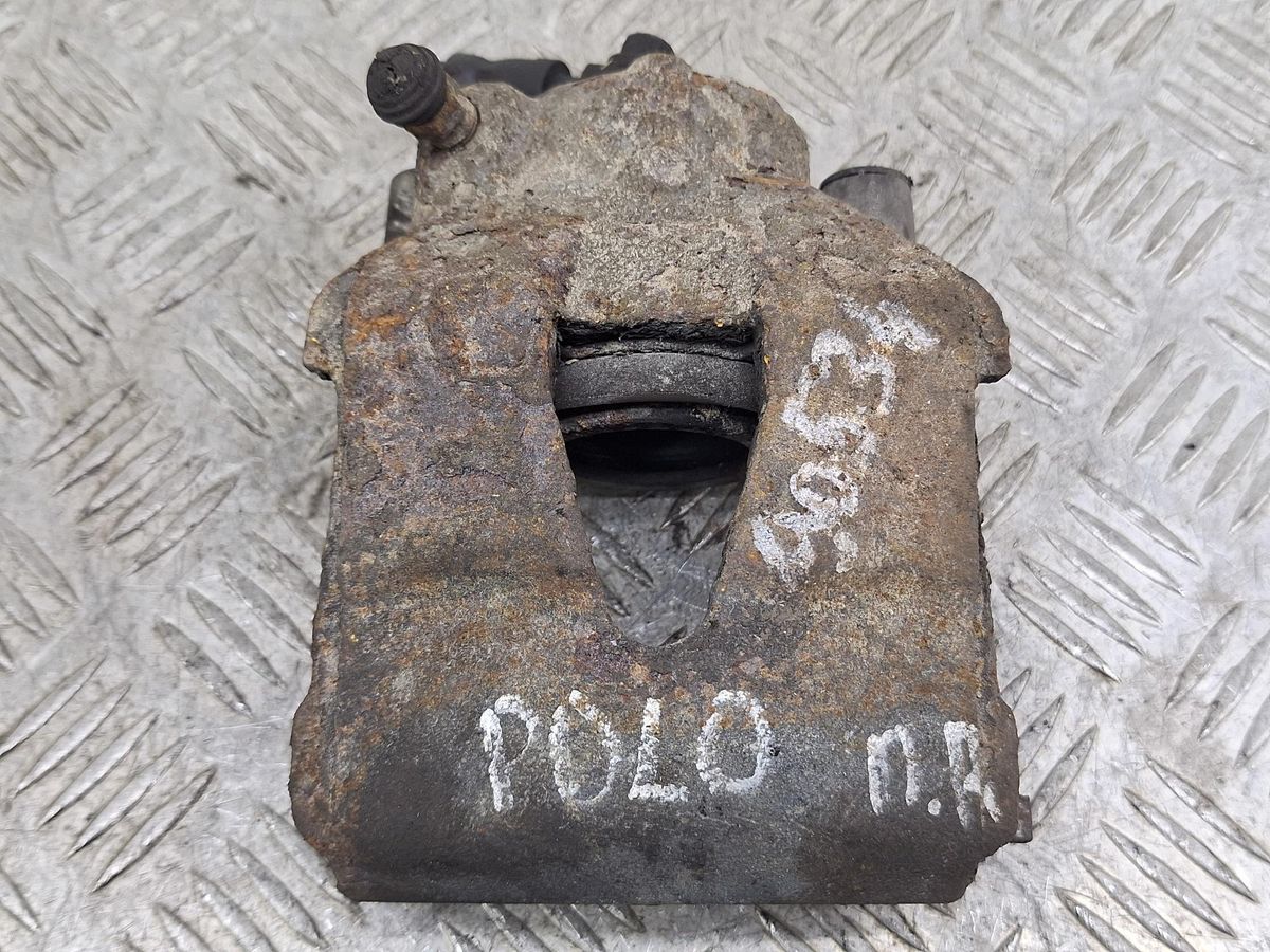 Суппорт передний правый к Volkswagen Polo 2006