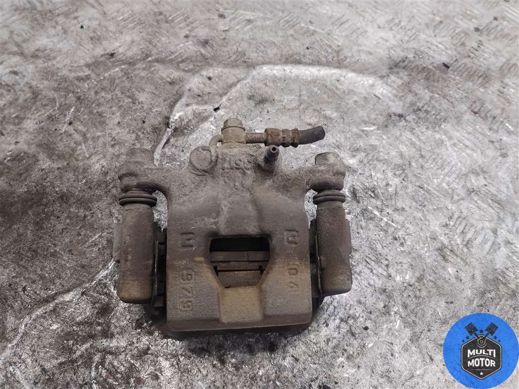 Суппорт задний правый к Nissan Qashqai 2008