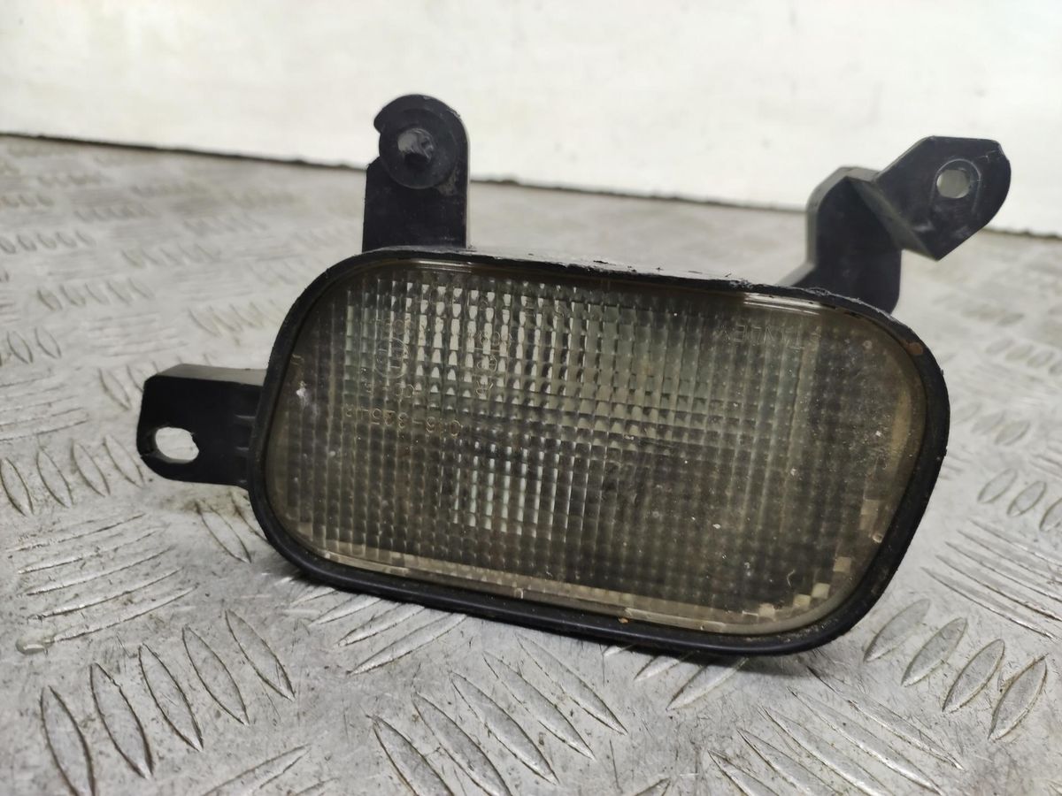 Фонарь противотуманный правый к Mazda 323 1995