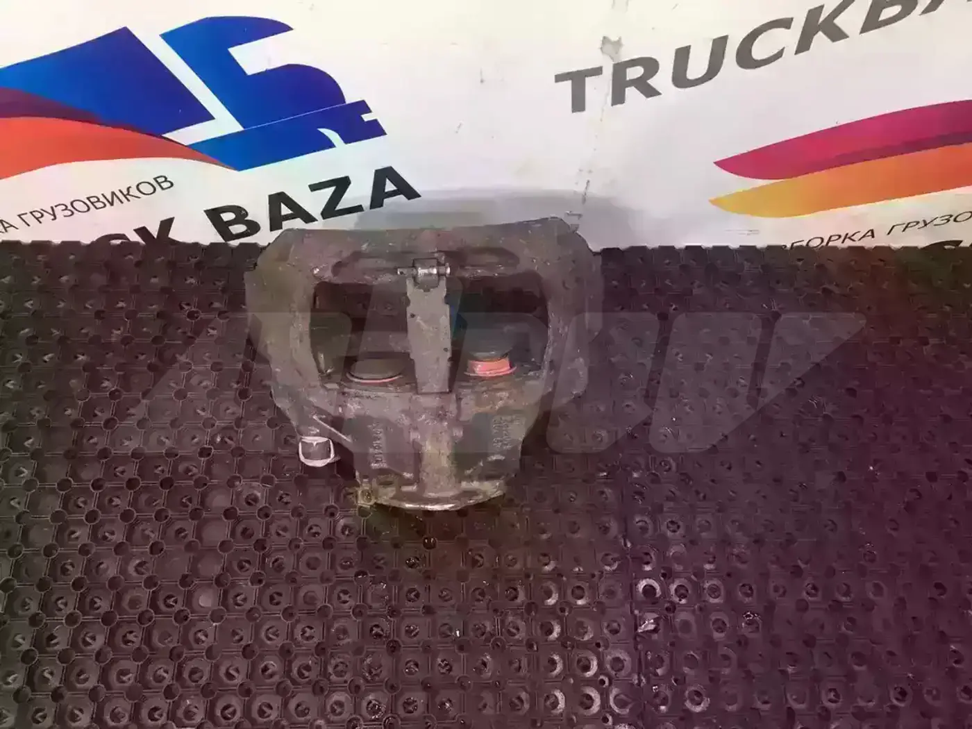 Суппорт передний левый к Scania  2008