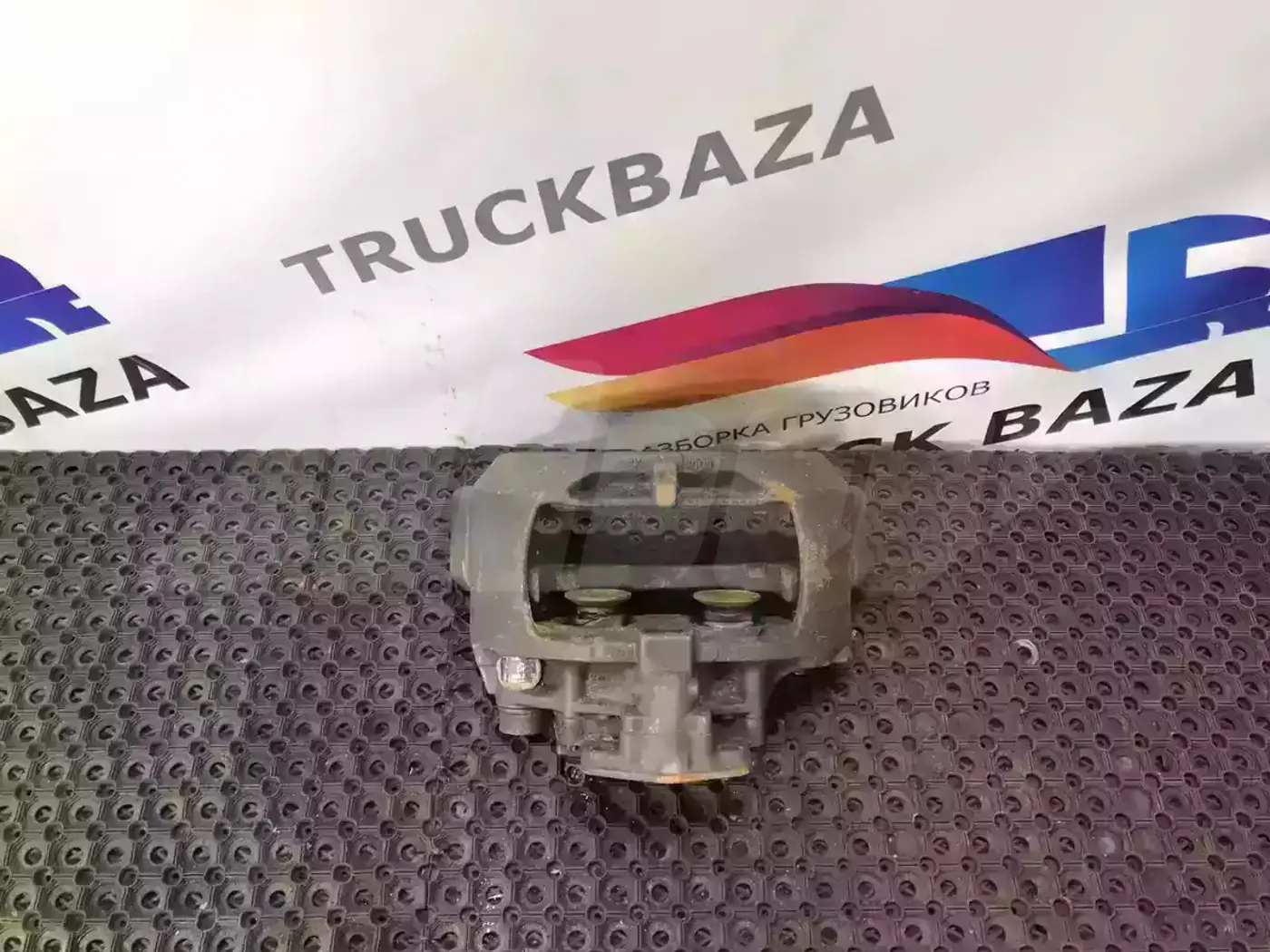 Суппорт передний левый к Scania  1998