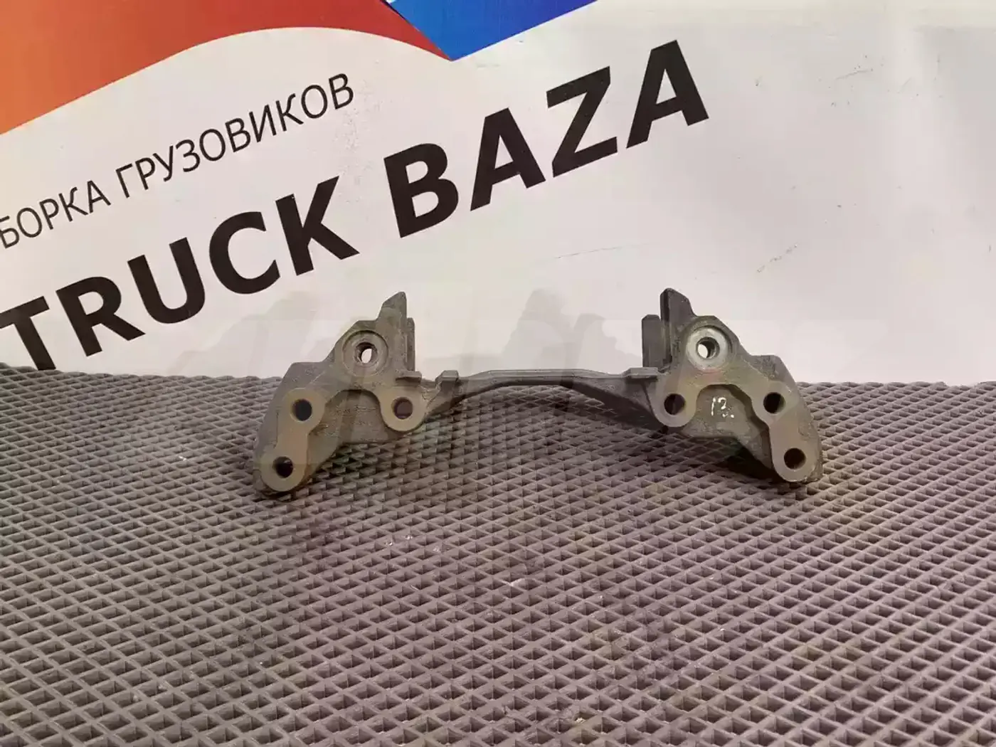 Скоба суппорта к MAN TGX 2000