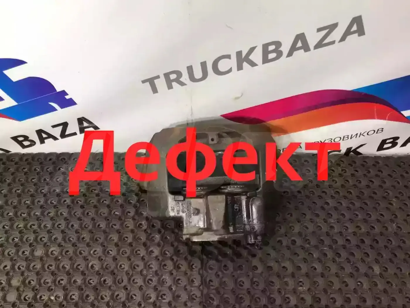 Суппорт передний левый к MAN TGX 2000