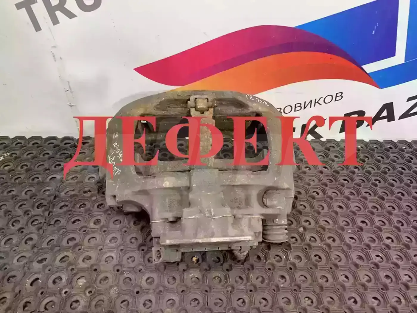 Суппорт передний левый к Scania  1995
