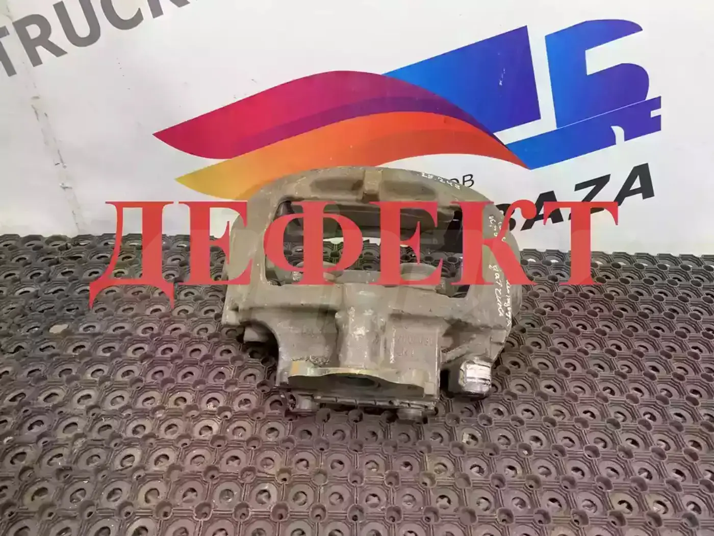 Суппорт передний левый к MAN TGX 2000