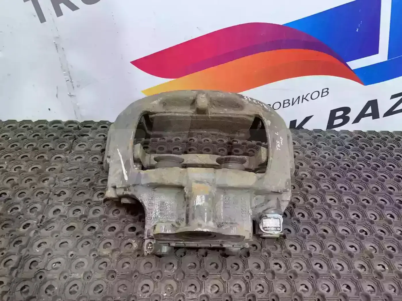 Суппорт передний левый к MAN TGX 2000