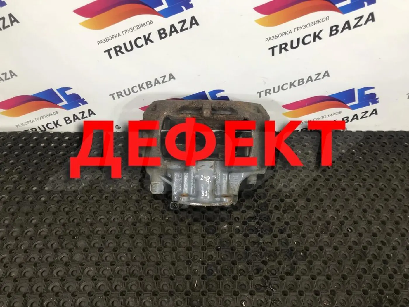 Суппорт передний левый к Scania  2004