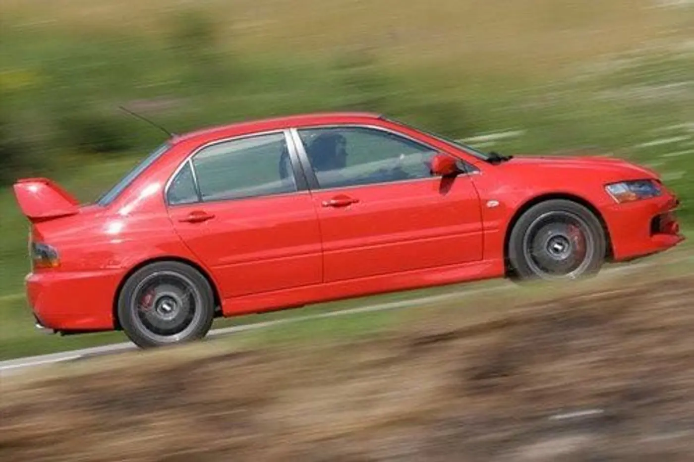 Mitsubishi Lancer Evo IX или Subaru Impreza WRX STI: что выбрать?