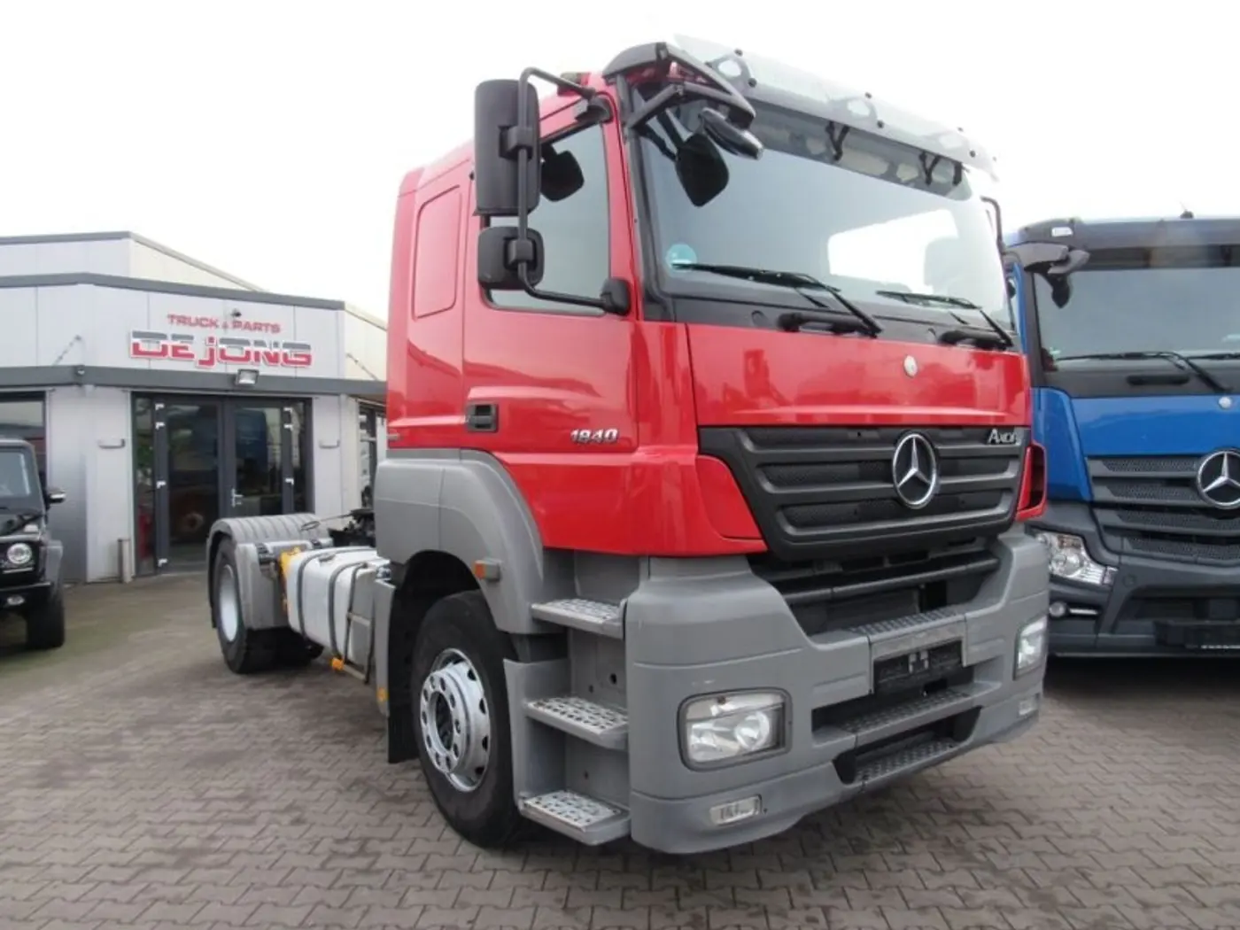 Стекло фары противотуманной левое к Mercedes-Benz Axor 2007