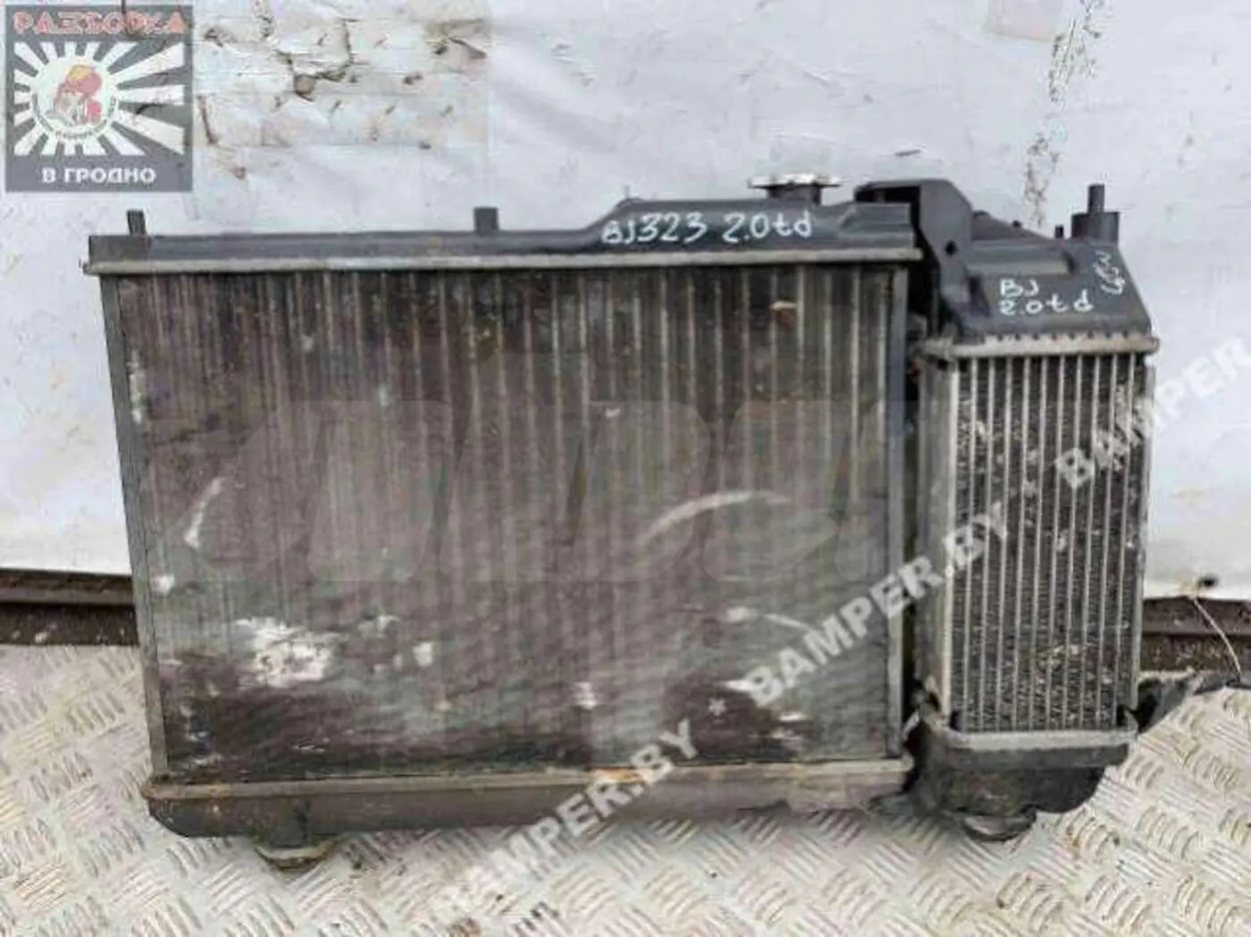 Интеркулер к Mazda 323 2001