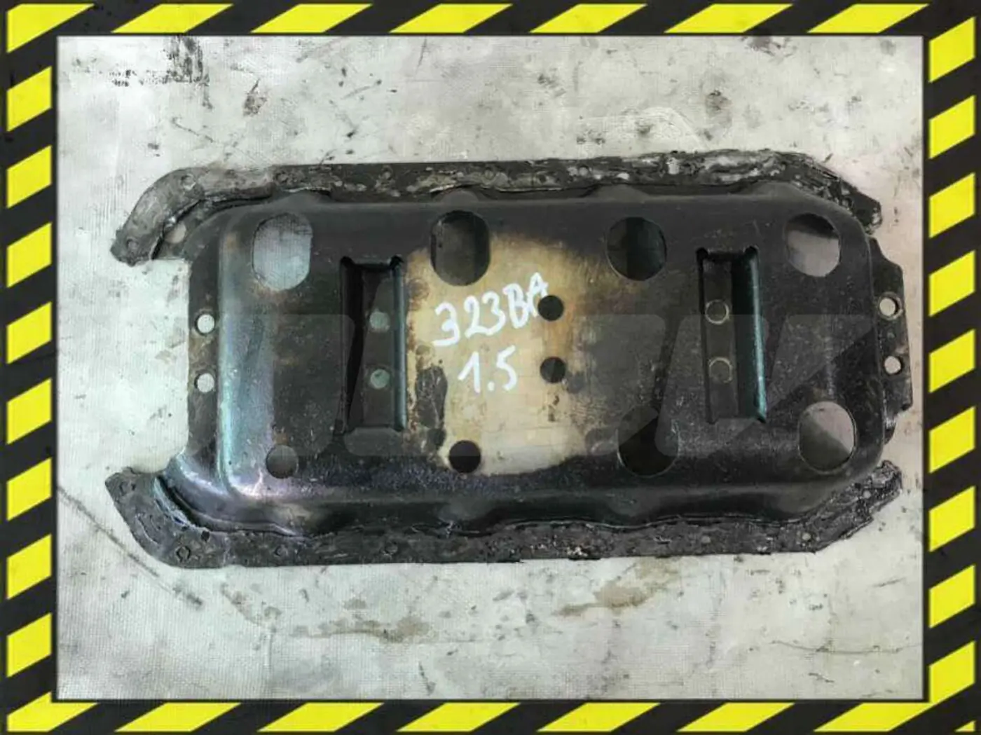 Поддон к Mazda 323 1997